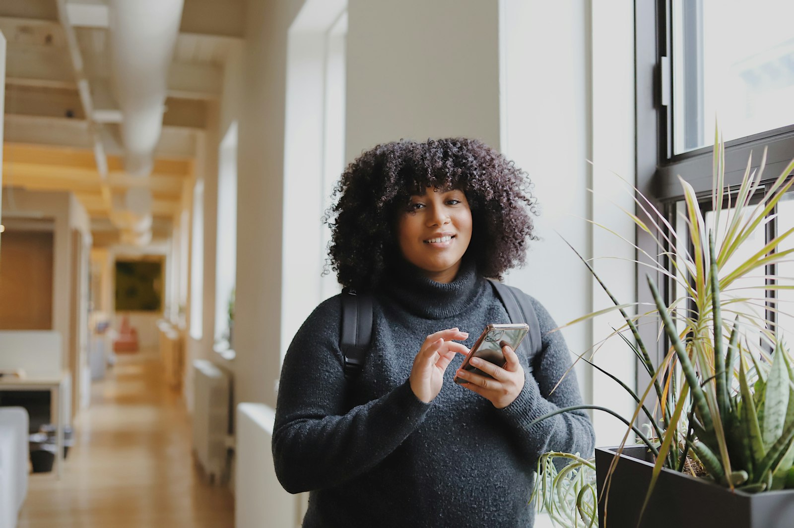 Woman checking email on her phone