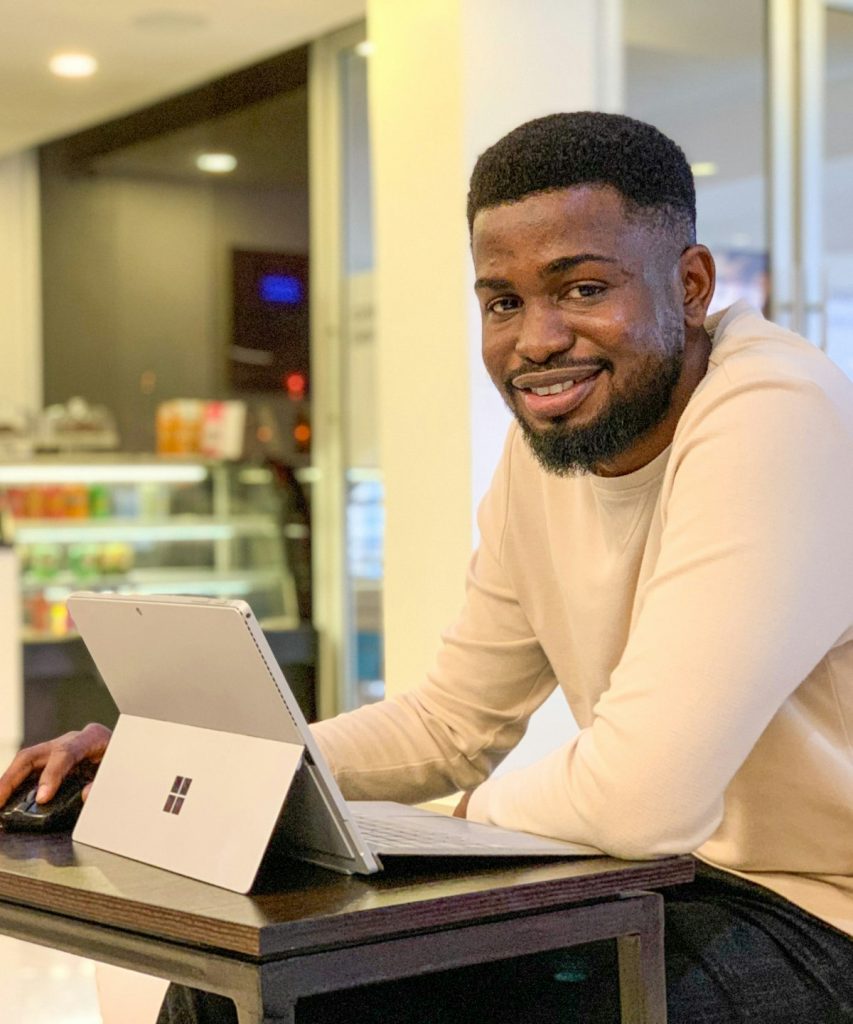 Designer reviewing a high-converting homepage on a tablet